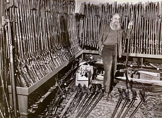  Joe Kindig in his gun room.png